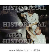 Historical Photo of a Male and Female Riveters Working on an Airplane Together by Al