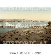 Historical Photochrom of a Man on the Shore Watching Waves Crash at Sidon (Zidon, Saida) Lebanon by Al