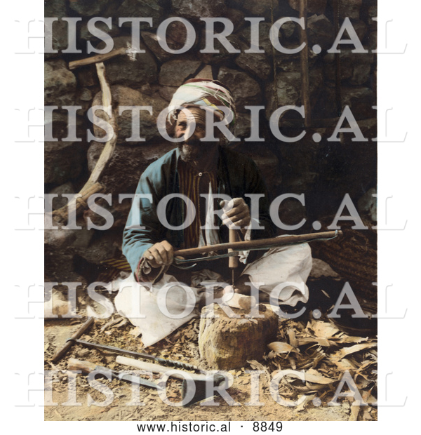 Historical Image of an Arab Carpenter Man Smiling and Posing While Making Plows