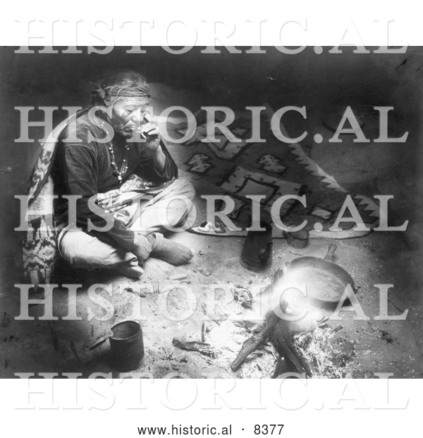 Historical Image of Navajo Indian Smoking by Fire 1915 - Black and White Version