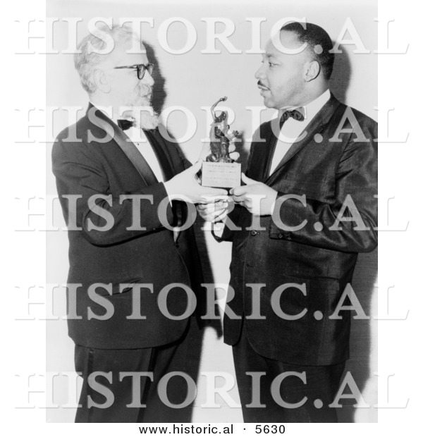 Historical Photo of Abraham Heschel and Martin Luther King Jr. Holding a Small Statue - Black and White Version