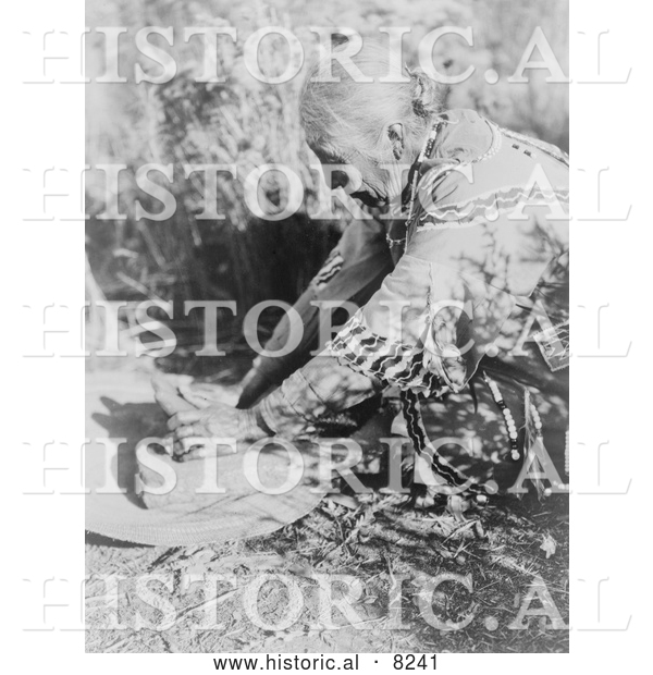Historical Photo of Klamath Woman Grinding Wokas 1923 - Black and White