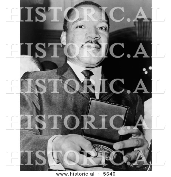 Historical Photo of Martin Luther King Jr. Holding a Medallion - Black and White Version