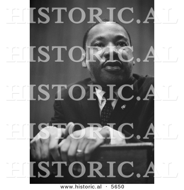 Historical Photo of Martin Luther King Jr. Leaning on a Lectern - Black and White Version