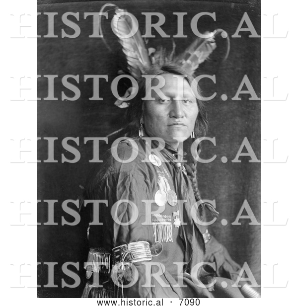 Historical Photo of Sioux Indian Man, Charging Thunder, Wearing a Feathered Headdress, from Buffalo Bill’s Wild West Show, 1900 - Black and White