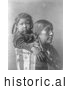 Historical Photo of Apsaroke Indian Mother with Child on Her Back 1908 - Black and White by Picsburg