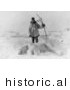 Historical Photo of Male Eskimo Hunter Carrying Bow and Arrows, Standing over a Dead Polar Bear - Native American Indian - Black and White Version by JVPD