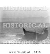 Historical Image of a Canoe on Shore at Flathead Lake, Montana 1910 - Black and White by Al