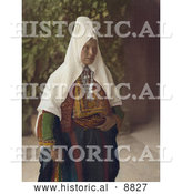 Historical Image of an Arab Woman Wearing Dowry Necklace and Traditional Clothing by Al