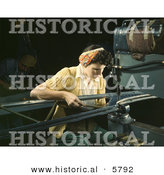 Historical Photo of a Female Riveter Riveting Metal Pieces Together by Al