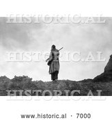 December 13th, 2013: Historical Photo of Sioux Man with Rifle and Bow 1905 - Black and White by Al