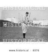 Historical Photo of Tyrus Raymond Cobb of the Detroit Tigers, Standing and Posing with a Bat in a Field - Black and White Version by Al