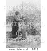December 13th, 2013: Historical Photo of Wichita Indian Using a Mortar and Pestle 1927 - Black and White by Al