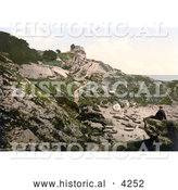 Historical Photochrom of a Man on a Beach Rock Looking at the Rufus Castle Ruins, Church Ope Cove, Isle of Portland, Dorset, England by Al