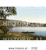 Historical Photochrom of a Man Rowing a Boat by the Docks and Belsfield Hotel in Bowness on Lake Windermere Lake District Cumbria England UK by Al