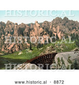 August 11th, 2013: Historical Photocrom of a Bridge of Train Tracks near Mountains in Cathedral Park, Colorado by Al
