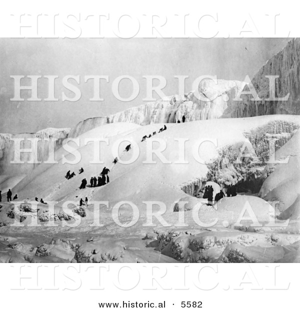 Historical Photo of People Hiking a Snowy Mountain to the Icy Niagara Falls - Black and White Version