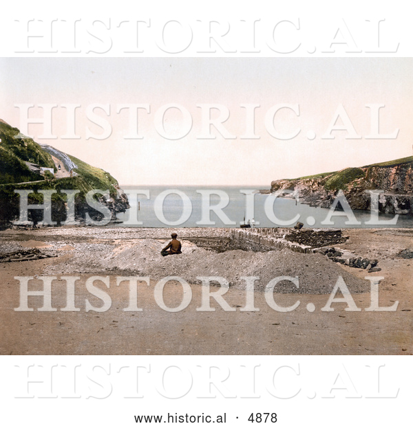 Historical Photochrom of a Man on the Beach at Port Isaac Port Gavern Cornwall England United Kingdom