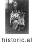 Historical Image of Cayuse Native American Indian Mother with Baby 1910 - Black and White by Picsburg